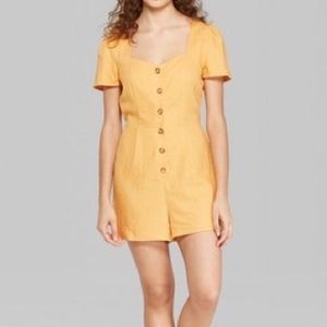 Yellow button up romper